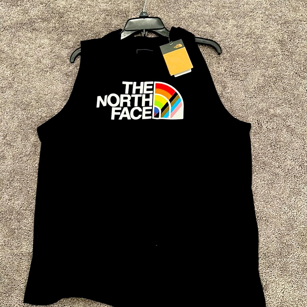 Men or women shirt. Brand The north face